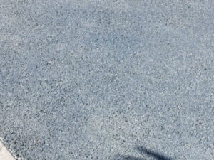 Extension de maison avec béton drainant sous carport à Basse Goulaine proche de Nantes